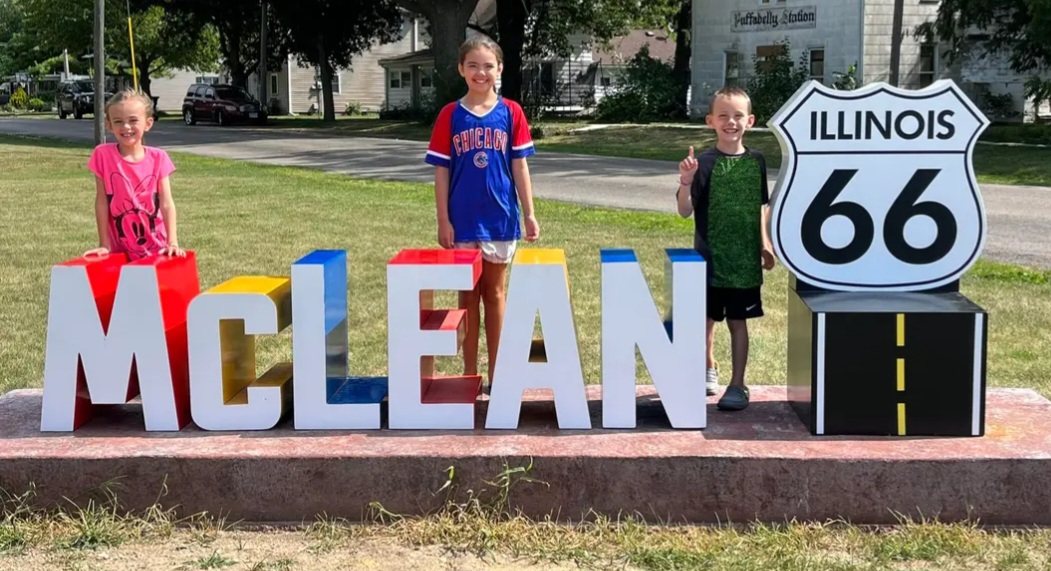 Anderson kids enjoying our new sign!