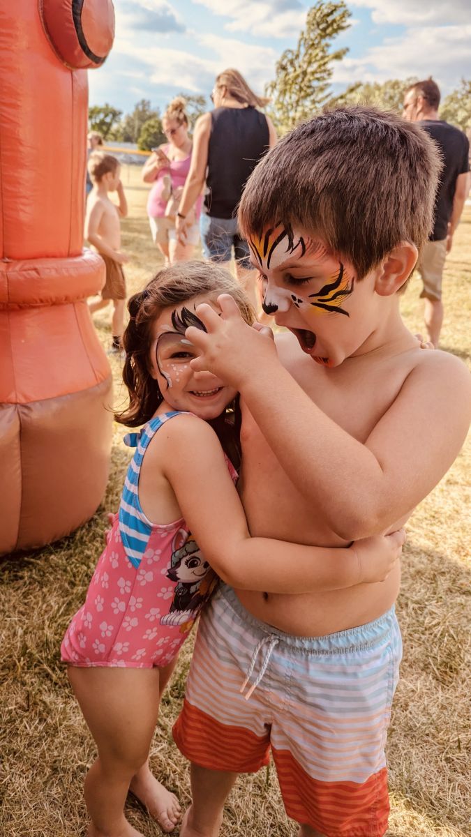 Jameson and Nora Mcdannald enjoying the face painting!